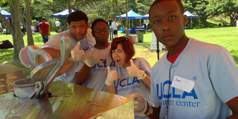 Students and teacher at a park