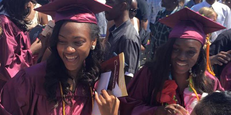 Students with graduation caps and gowns